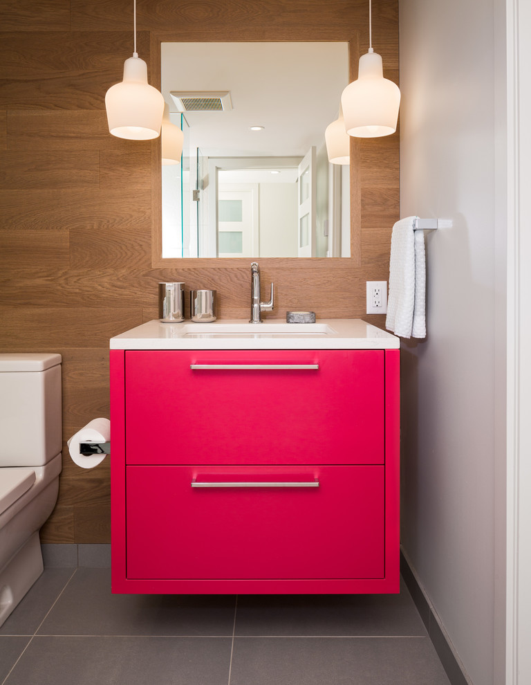 Transitional powder room photo in Vancouver with flat-panel cabinets, red cabinets and white countertops