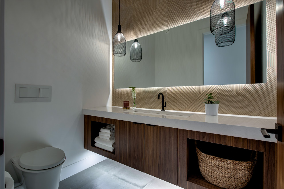 Inspiration for a large contemporary powder room remodel in Calgary