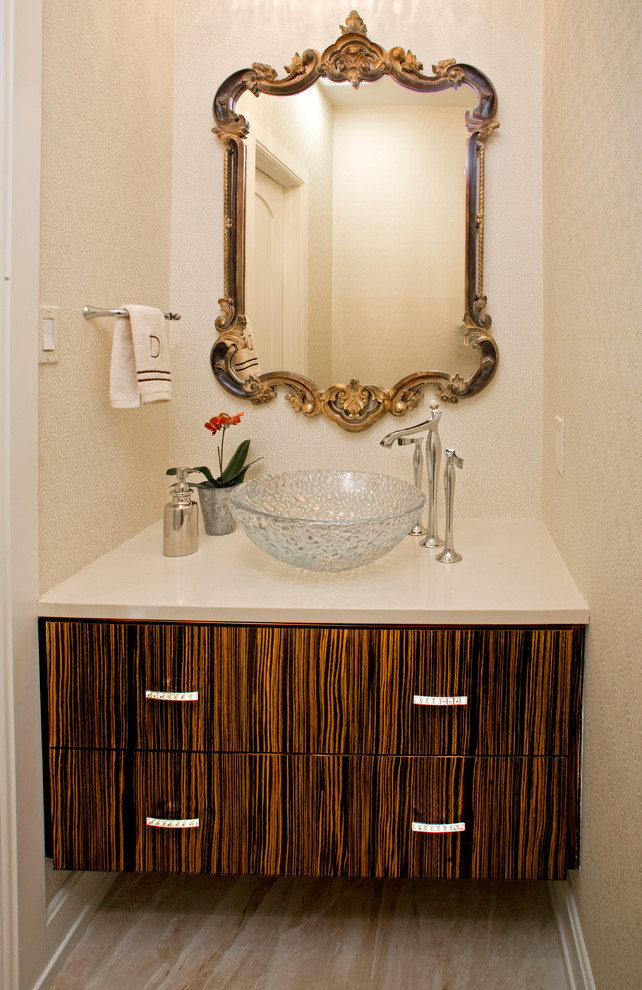 Small contemporary cloakroom in Philadelphia with flat-panel cabinets, dark wood cabinets and white walls.