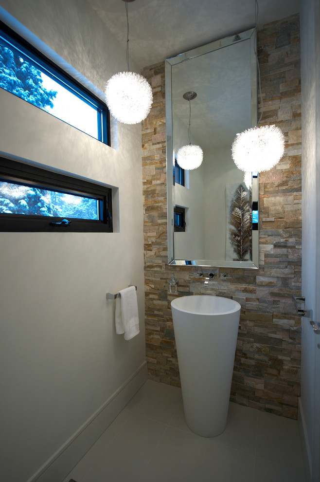 Inspiration for a contemporary powder room remodel in Toronto