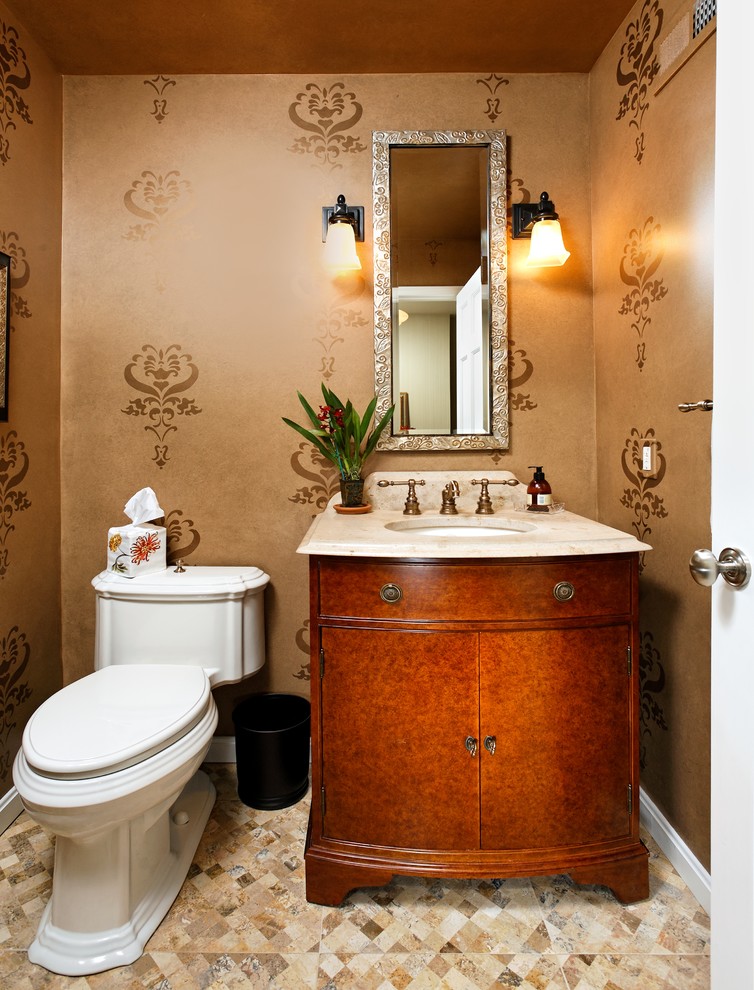 Foto di un bagno di servizio design con lavabo sottopiano