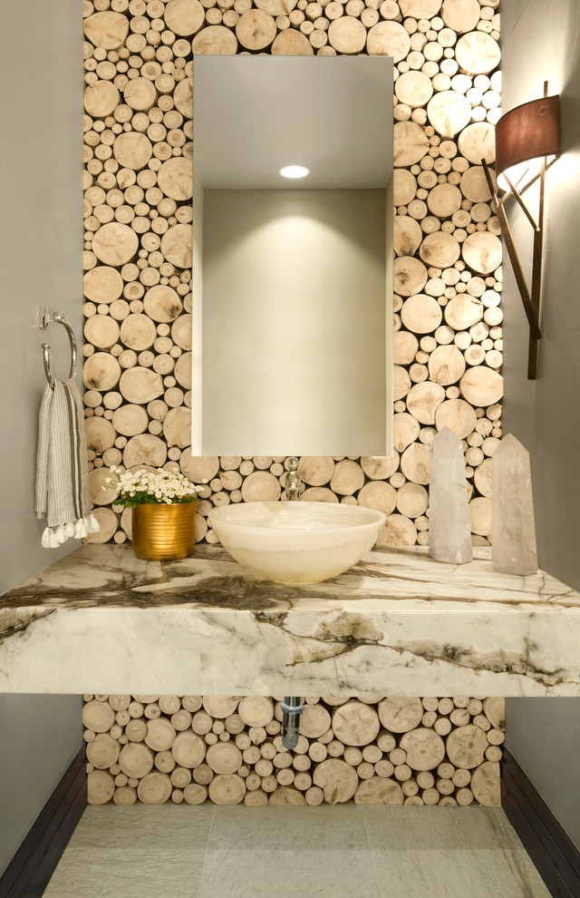 デンバーにあるコンテンポラリースタイルのおしゃれなトイレ・洗面所 (グレーの壁、ベッセル式洗面器、グレーの床、白い洗面カウンター) の写真