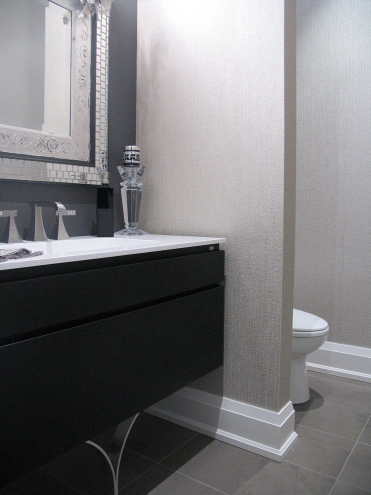 Example of a trendy powder room design in Toronto