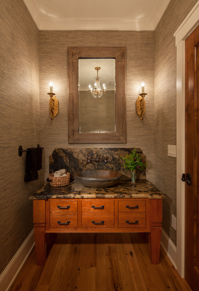 Inspiration for a traditional cloakroom in Minneapolis with a vessel sink.