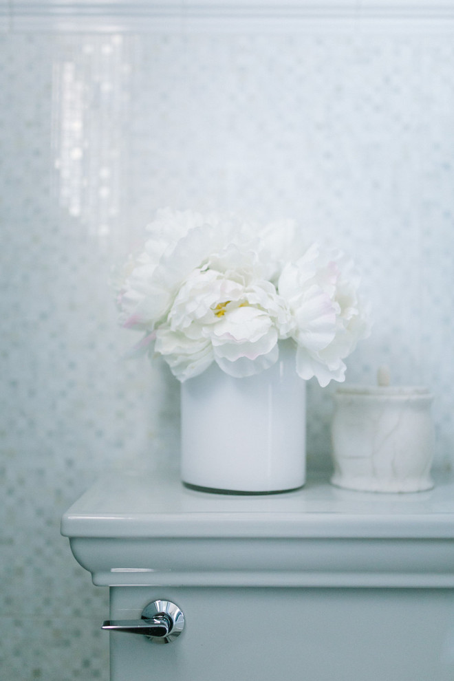 Inspiration for a transitional powder room remodel in Portland Maine