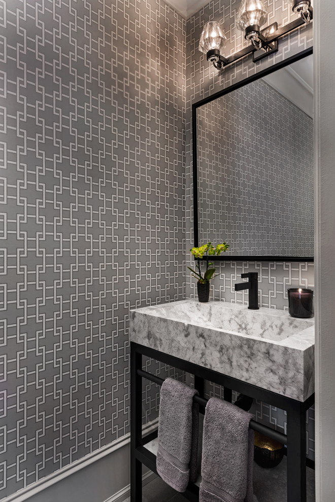 Powder room - large transitional powder room idea in Toronto with gray walls and a console sink