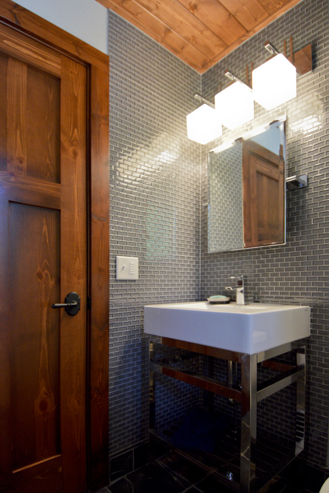 Rustic cloakroom in Minneapolis with grey tiles, glass tiles, grey walls, slate flooring, a pedestal sink and multi-coloured floors.