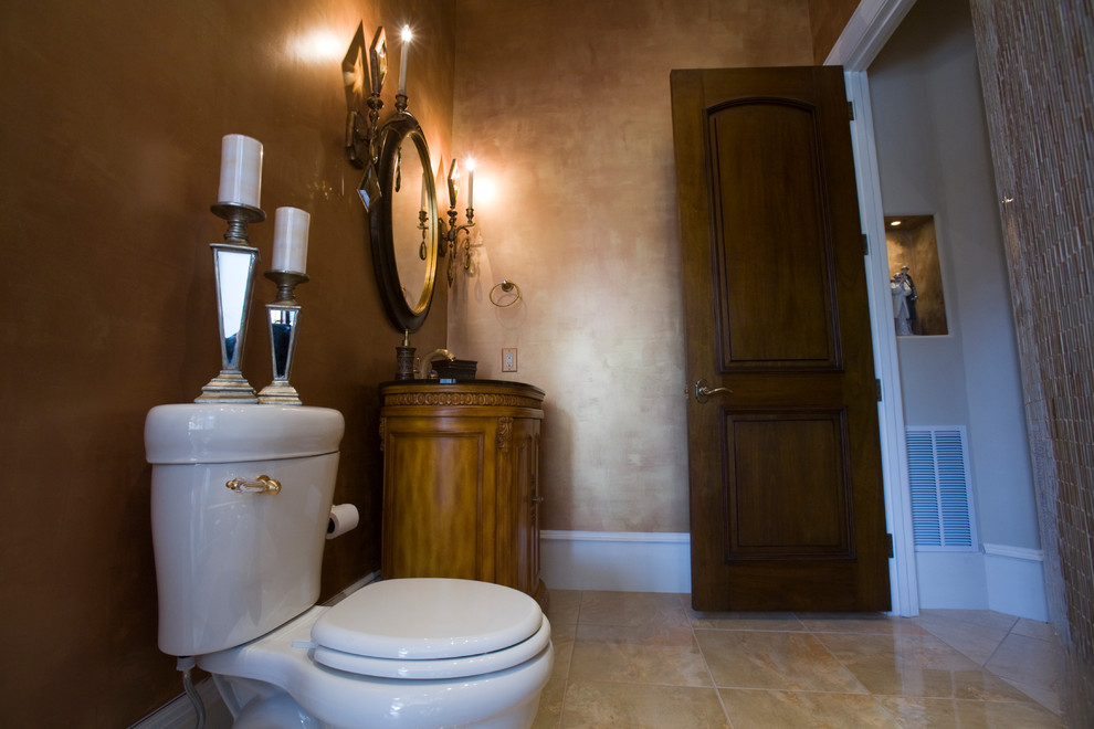 Tuscan powder room photo in Raleigh