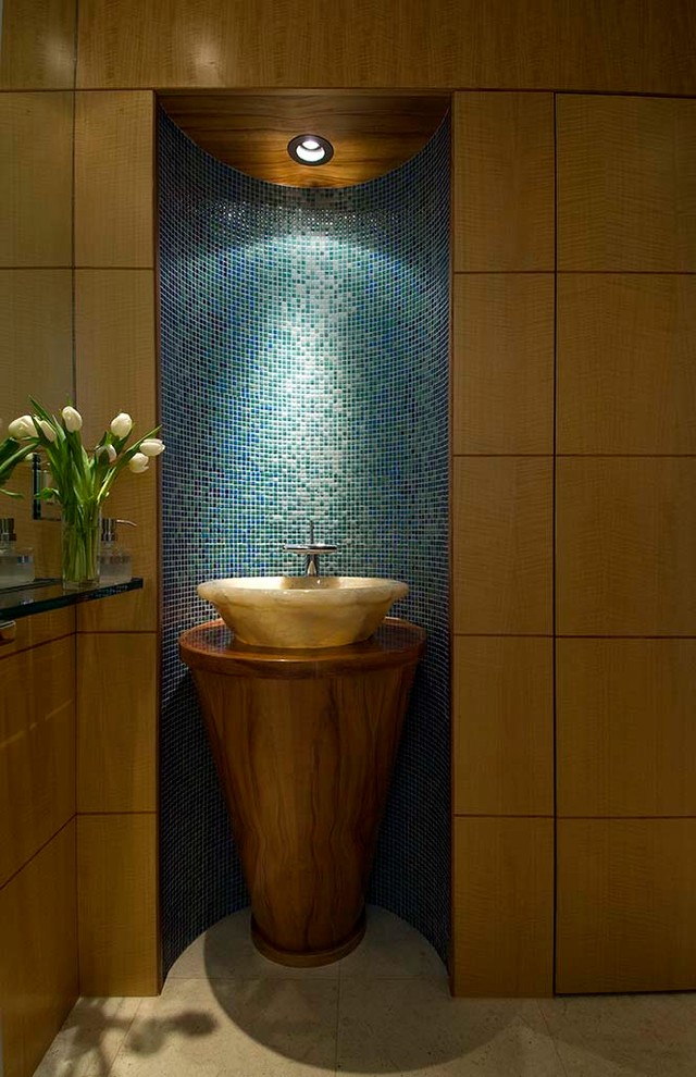 Design ideas for a small contemporary cloakroom in Hawaii with flat-panel cabinets, medium wood cabinets, blue tiles, green tiles, mosaic tiles, brown walls, ceramic flooring, a vessel sink, wooden worktops, beige floors and brown worktops.
