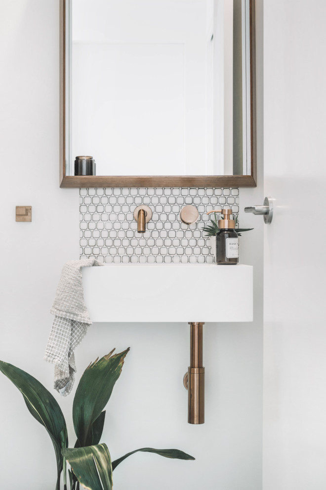 Design ideas for a nautical cloakroom in Gold Coast - Tweed with white walls and a wall-mounted sink.