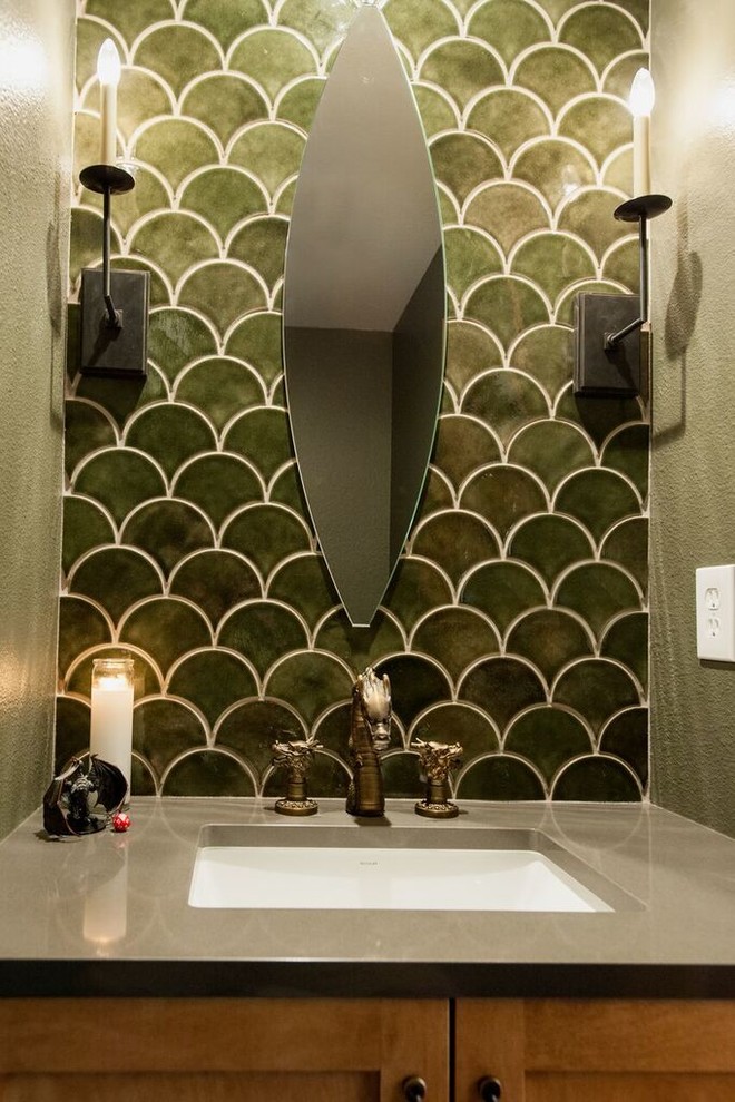 Photo of a small eclectic cloakroom in Seattle with shaker cabinets, dark wood cabinets, a two-piece toilet, green tiles, ceramic tiles, green walls, porcelain flooring, a submerged sink and engineered stone worktops.