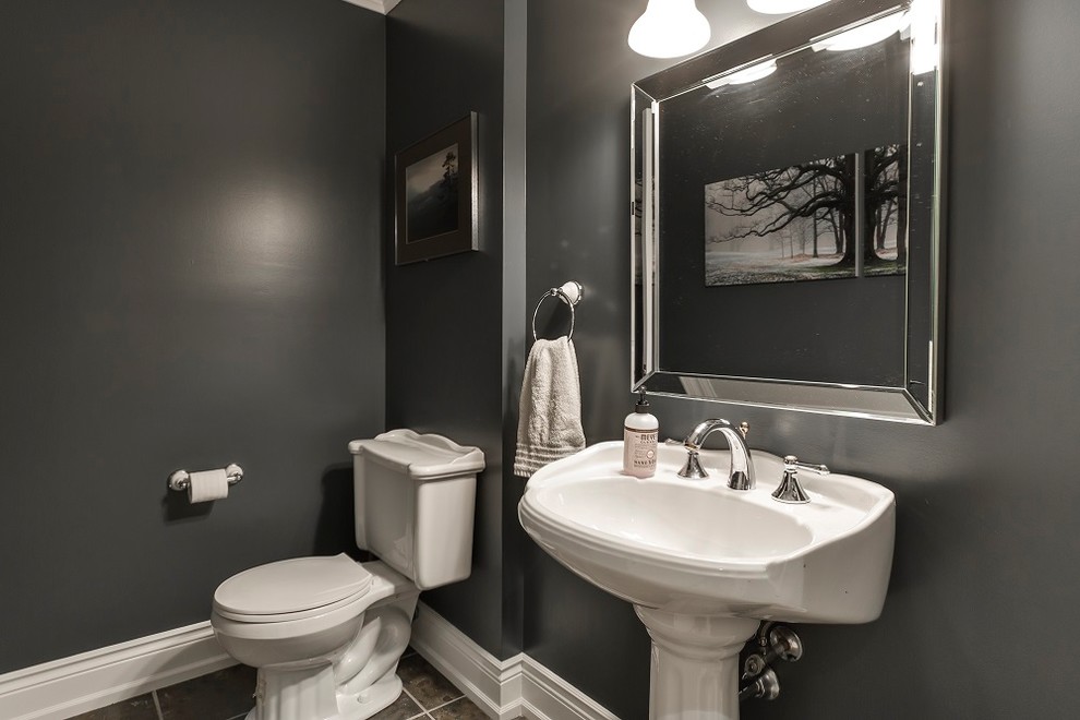 This is an example of a small contemporary cloakroom in Toronto with a one-piece toilet, grey walls, slate flooring, a pedestal sink and grey floors.