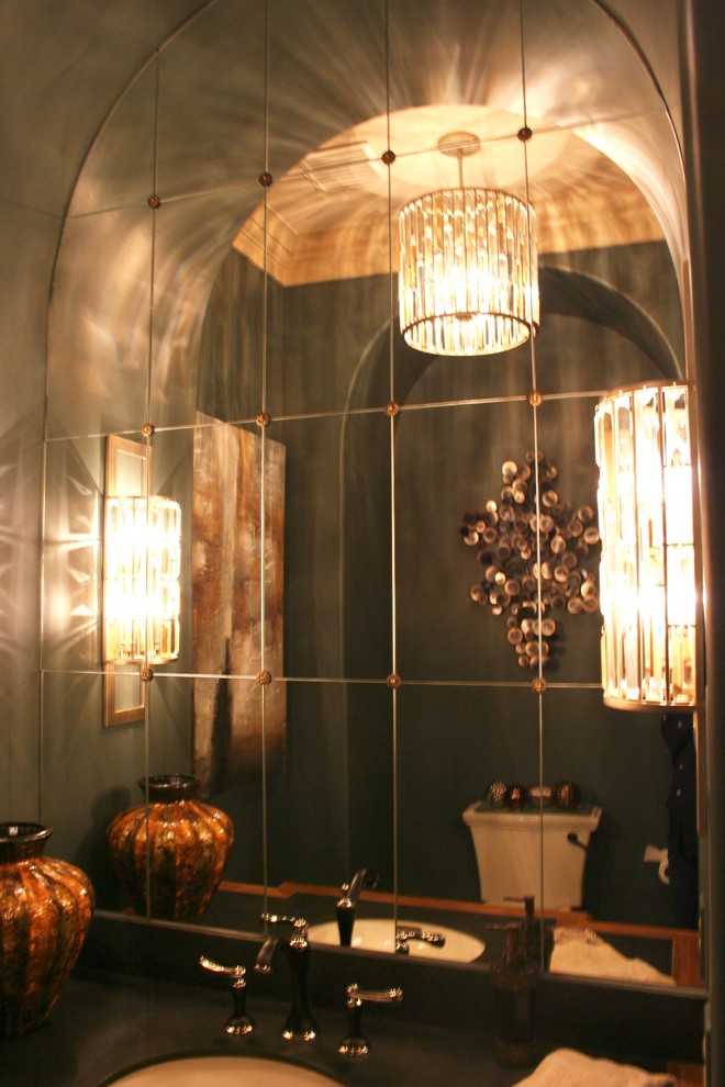 На фото: туалет среднего размера в стиле неоклассика (современная классика) с раздельным унитазом, серыми стенами, паркетным полом среднего тона и врезной раковиной с