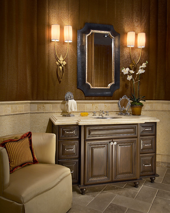 Mid-sized elegant linoleum floor powder room photo in Phoenix with furniture-like cabinets, brown cabinets, brown walls, an undermount sink and marble countertops