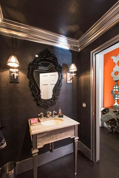 Photo of a small bohemian cloakroom in Los Angeles with black walls, ceramic flooring, a submerged sink and marble worktops.