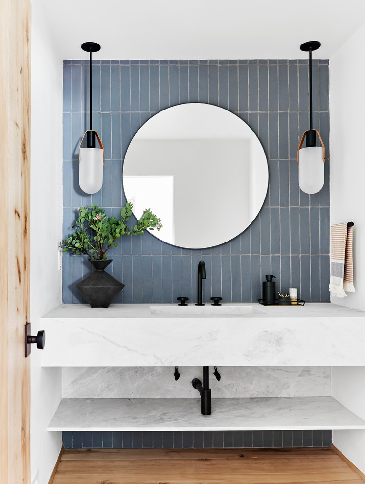Inspiration for a rustic powder room remodel in Los Angeles