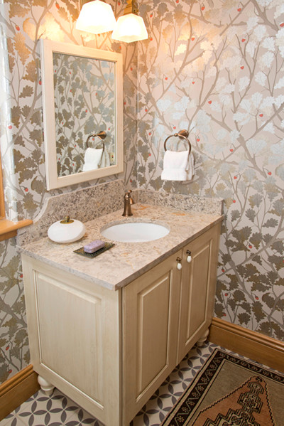 Example of a mid-sized eclectic multicolored tile ceramic tile powder room design in Denver with an undermount sink, furniture-like cabinets, white cabinets, marble countertops and multicolored walls
