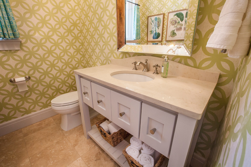 Medium sized traditional cloakroom in Oklahoma City with open cabinets, white cabinets, a two-piece toilet, beige tiles, ceramic tiles, multi-coloured walls, ceramic flooring, a submerged sink and engineered stone worktops.