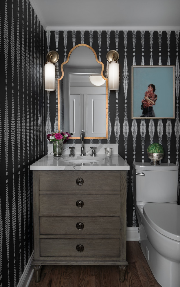 Inspiration for a small transitional white tile marble floor and brown floor powder room remodel in Detroit with furniture-like cabinets, gray cabinets, a two-piece toilet, white walls, an undermount sink, quartz countertops and white countertops