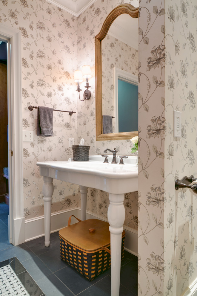 Large farmhouse gray tile slate floor powder room photo in Other with a two-piece toilet, multicolored walls and a vessel sink