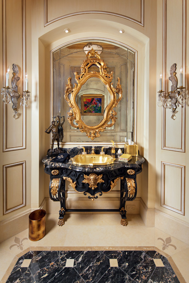 Example of a mid-sized tuscan marble floor powder room design in Chicago with a drop-in sink, furniture-like cabinets, black cabinets, a one-piece toilet and beige walls