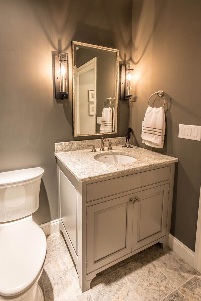 Example of a mid-sized transitional gray tile powder room design in Other with beaded inset cabinets, gray cabinets, gray walls, an undermount sink and granite countertops