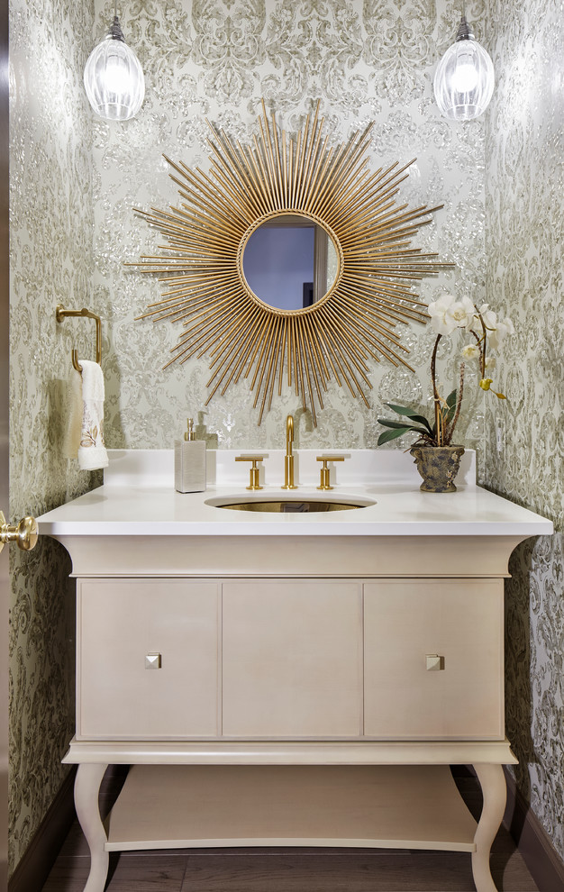 Example of a small transitional powder room design in Denver with an undermount sink, furniture-like cabinets, beige cabinets, multicolored walls and white countertops
