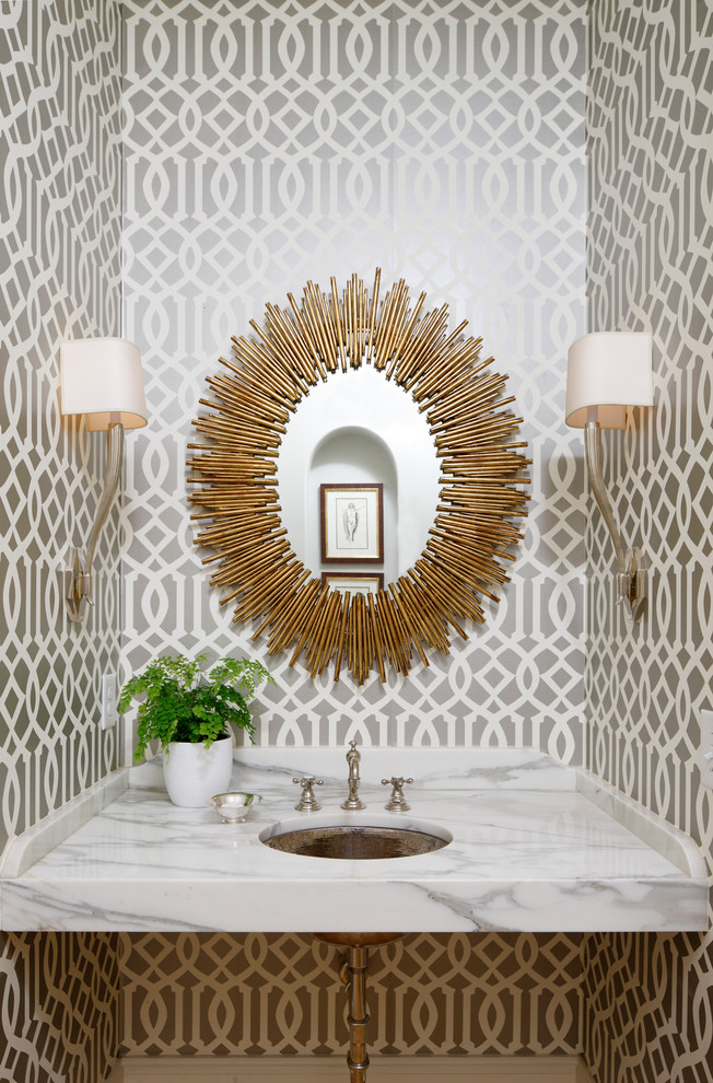 Transitional powder room photo in Atlanta with an undermount sink, marble countertops and multicolored walls
