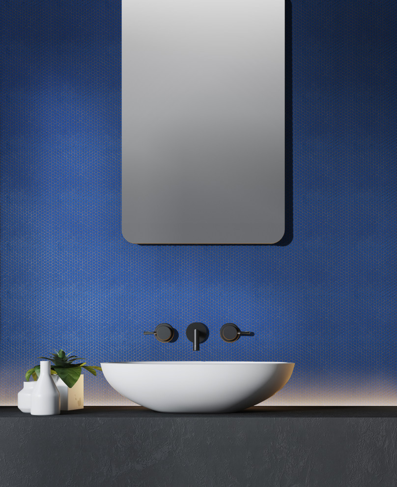 Inspiration pour un WC et toilettes design avec un carrelage bleu, un carrelage en pâte de verre, une vasque, un plan de toilette gris et meuble-lavabo suspendu.