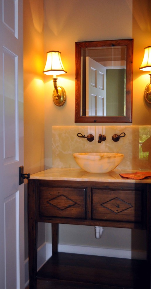 Photo of a classic cloakroom in Atlanta with a vessel sink and beige worktops.