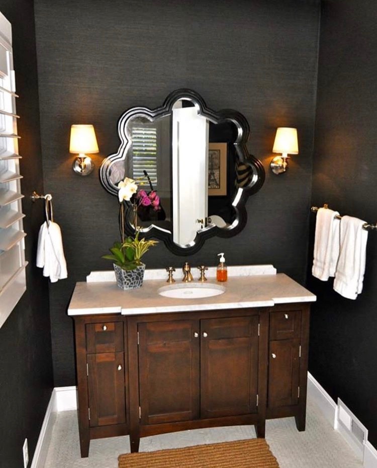 Mid-sized elegant porcelain tile and white floor powder room photo in DC Metro with beaded inset cabinets, beige cabinets, black walls, an undermount sink, marble countertops and white countertops