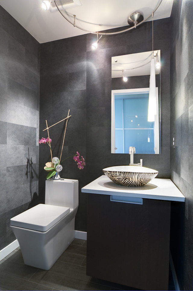 Inspiration for a small modern powder room remodel in Denver with a vessel sink and gray walls