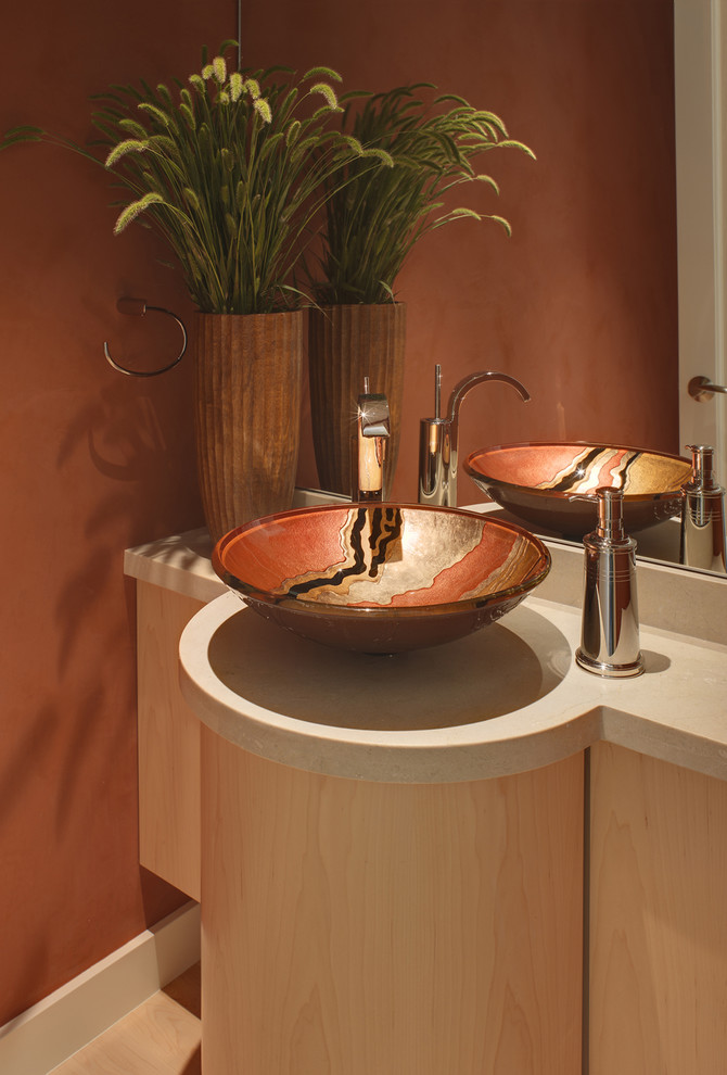 Example of a trendy powder room design in San Francisco with a vessel sink and beige countertops