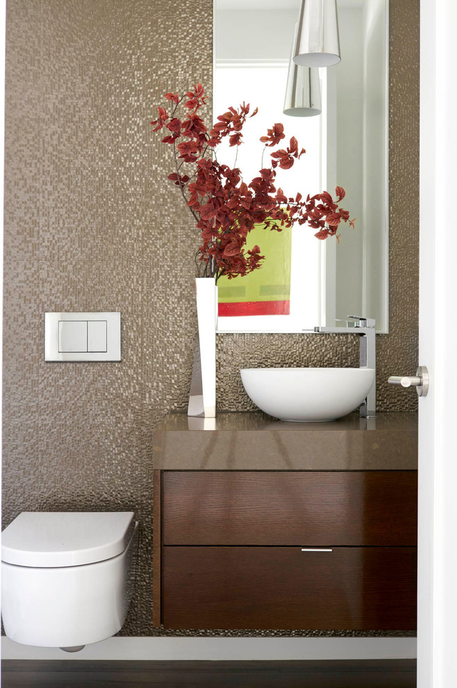 Powder room - small contemporary medium tone wood floor powder room idea in Dallas with flat-panel cabinets, dark wood cabinets, a wall-mount toilet, white walls, an undermount sink and quartz countertops