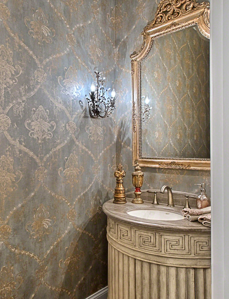 Esempio di un piccolo bagno di servizio chic con consolle stile comò, ante con finitura invecchiata, pareti grigie, top in marmo e top marrone