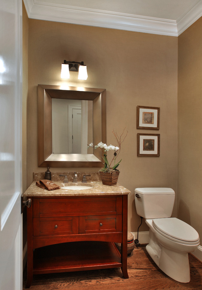 Inspiration for a medium sized classic cloakroom in DC Metro with shaker cabinets, dark wood cabinets, beige walls, dark hardwood flooring, a submerged sink, limestone worktops, brown floors and brown worktops.