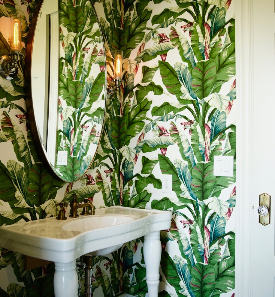 Example of an island style powder room design in Columbus