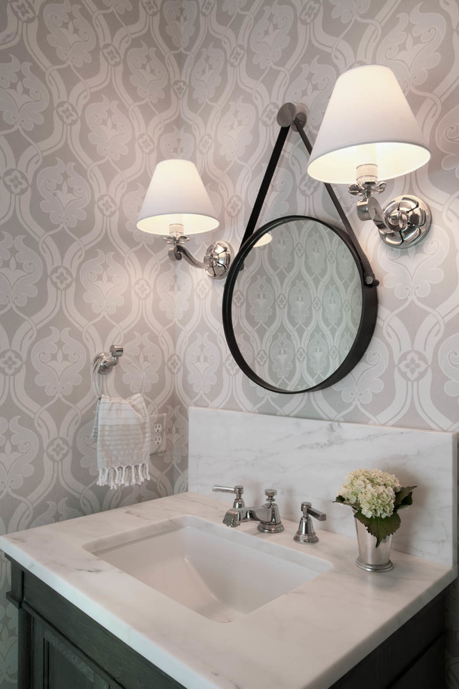 Powder room - transitional powder room idea in Atlanta with an undermount sink and gray walls