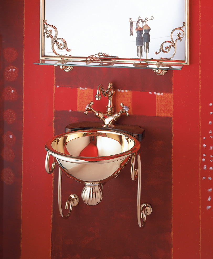 Imagen de aseo clásico pequeño con lavabo suspendido, encimera de madera y paredes rojas