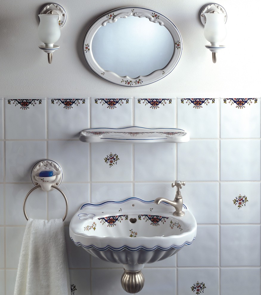 Example of a small classic ceramic tile and multicolored tile powder room design in Miami with a wall-mount sink and white walls