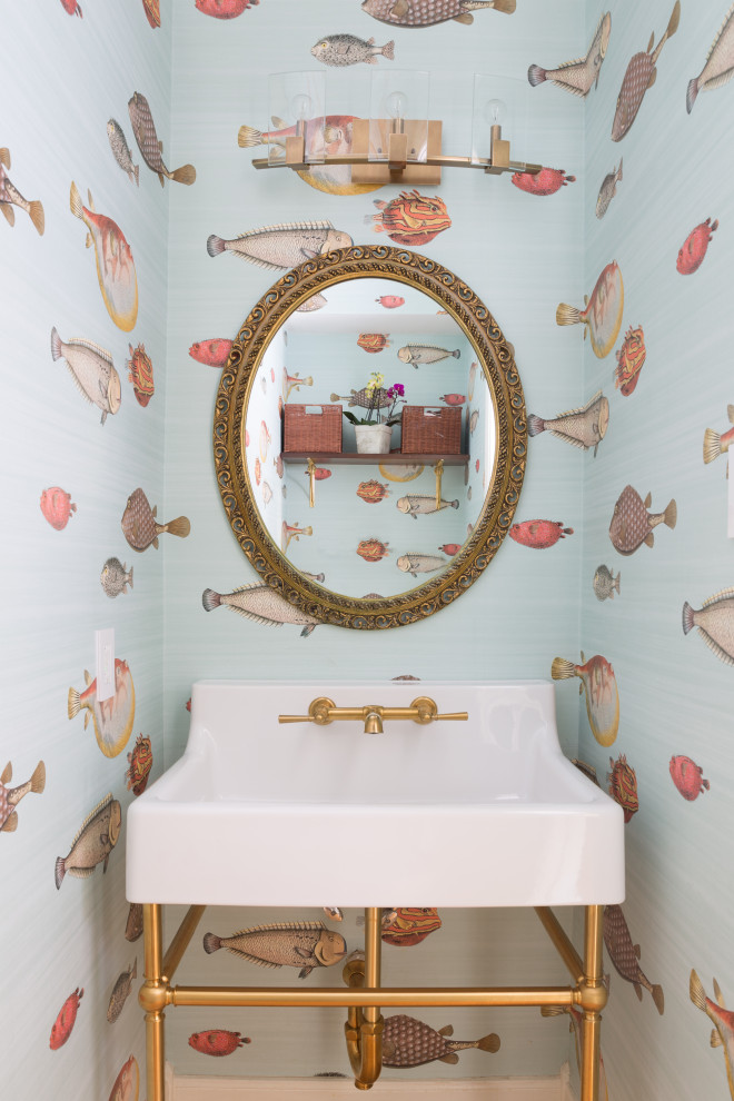 Inspiration for a small traditional cloakroom in San Francisco with a console sink.