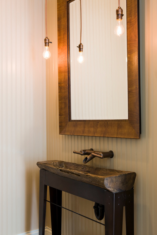 Example of a transitional powder room design in Denver with a trough sink