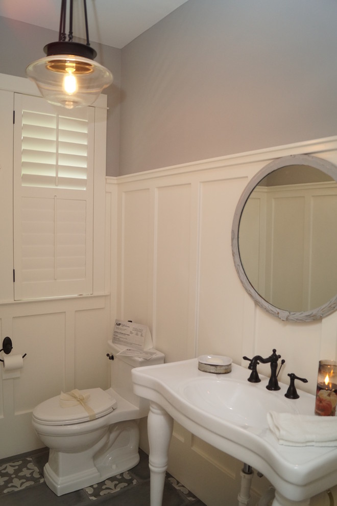 Example of an arts and crafts powder room design in Austin