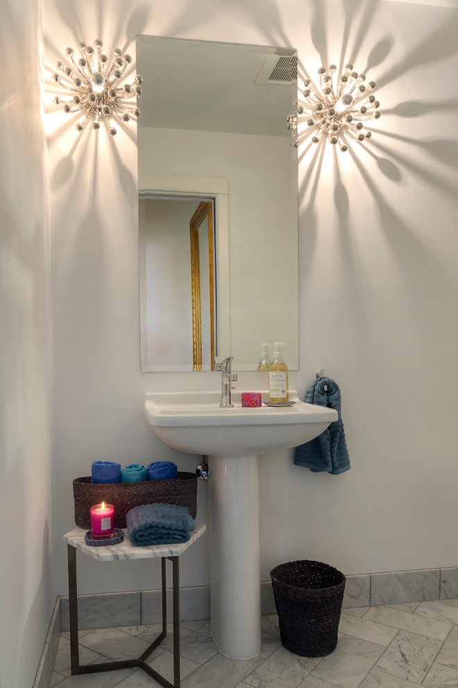 This is an example of a small contemporary cloakroom in Los Angeles with a pedestal sink, white walls, white tiles and marble flooring.