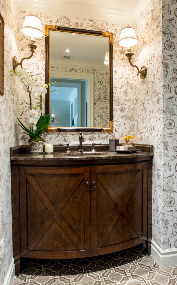 Example of a classic powder room design in Los Angeles with furniture-like cabinets, dark wood cabinets and multicolored walls