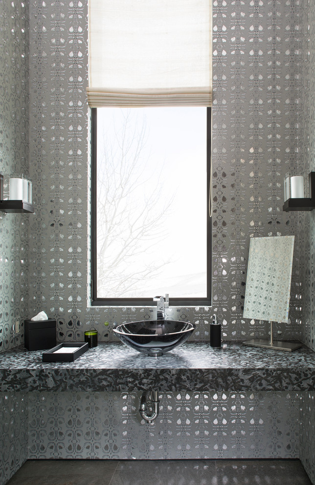 Example of a trendy powder room design in Denver with a vessel sink and gray walls