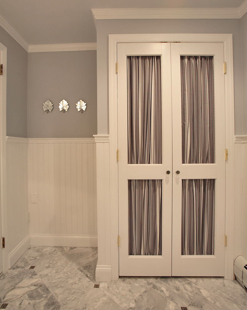 Example of a classic powder room design in Other