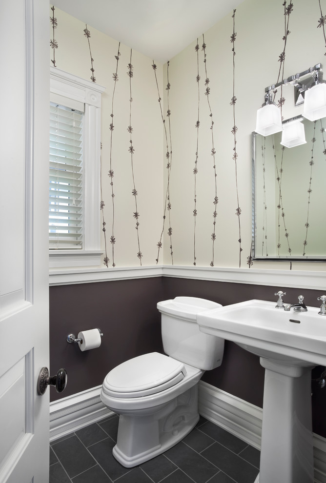 Example of a transitional powder room design in Chicago with a pedestal sink