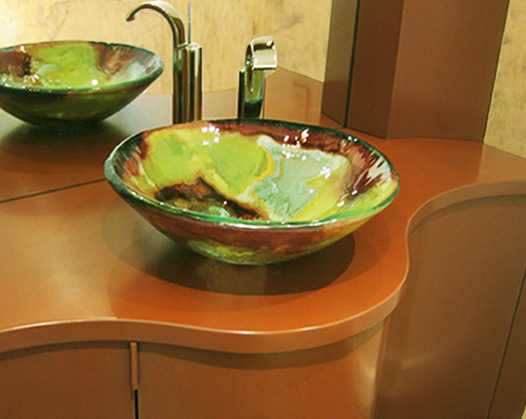 Small transitional powder room photo in Los Angeles with a vessel sink, furniture-like cabinets, wood countertops, beige walls and orange cabinets