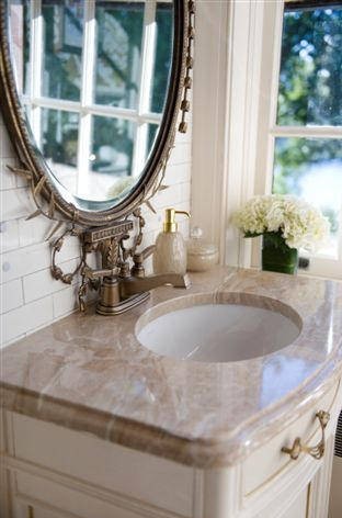 Design ideas for a traditional cloakroom in Richmond with beige worktops.